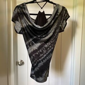 Small. Silky fabric with around the neck tie